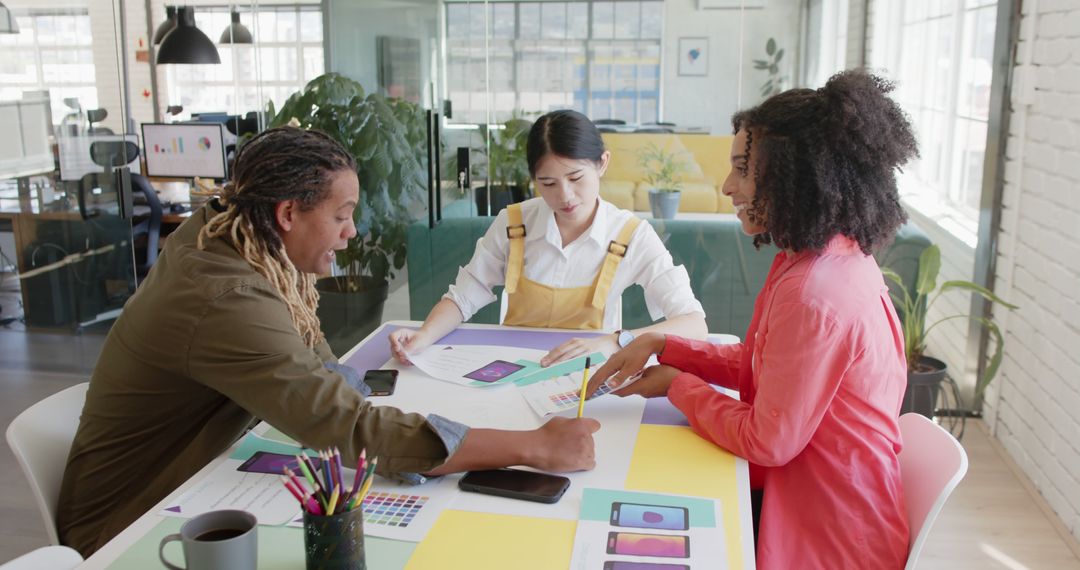 Diverse Team Discussing Design Concepts at Modern Office