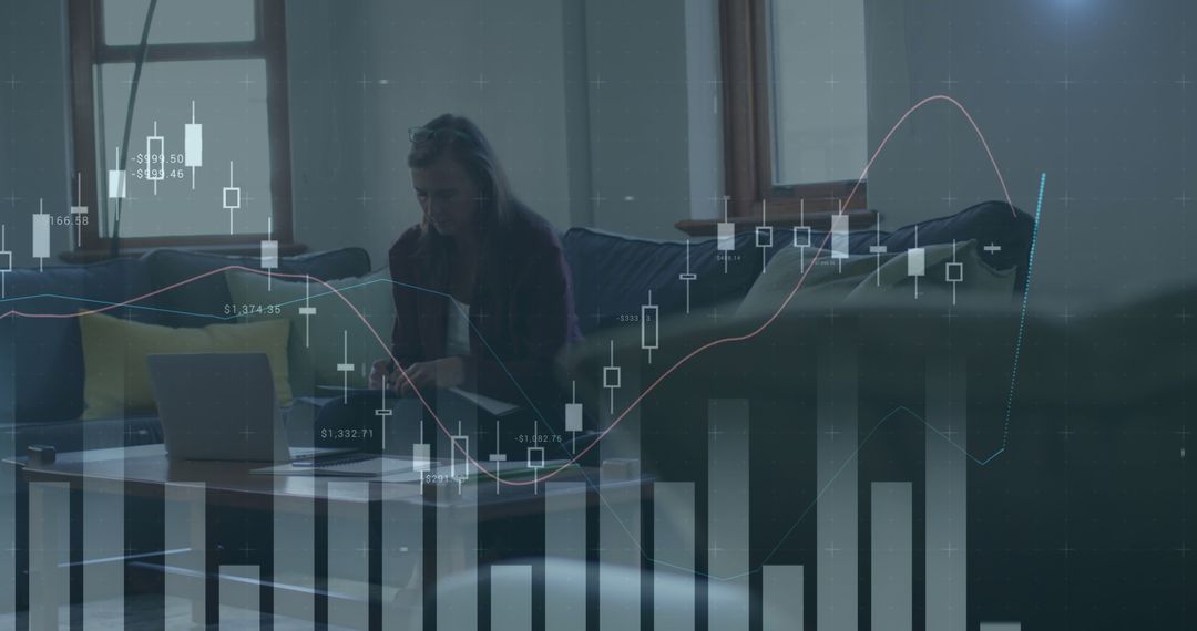 Businesswoman Analyzing Financial Data in an Office with Graph Overlay - Free Images, Stock Photos and Pictures on Pikwizard.com