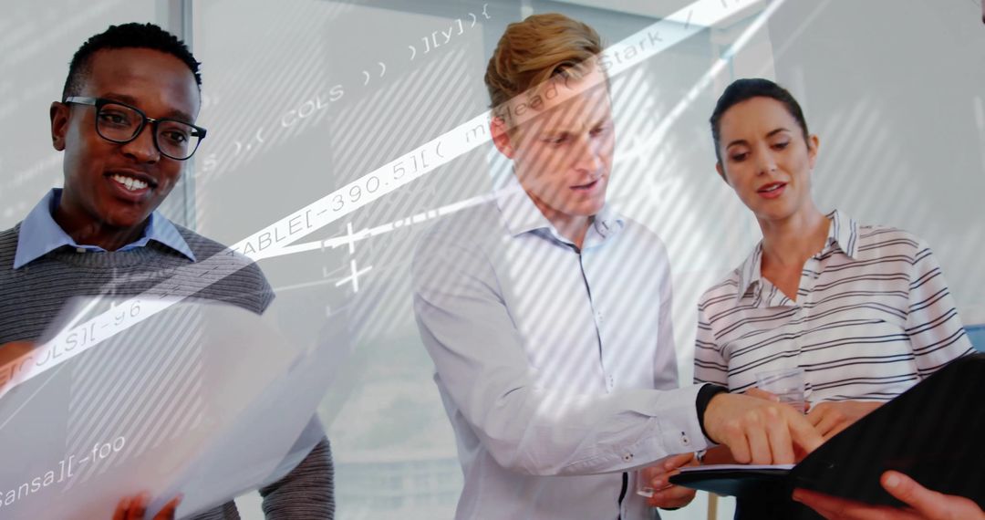 Team Collaborating with Technology in Office Meeting