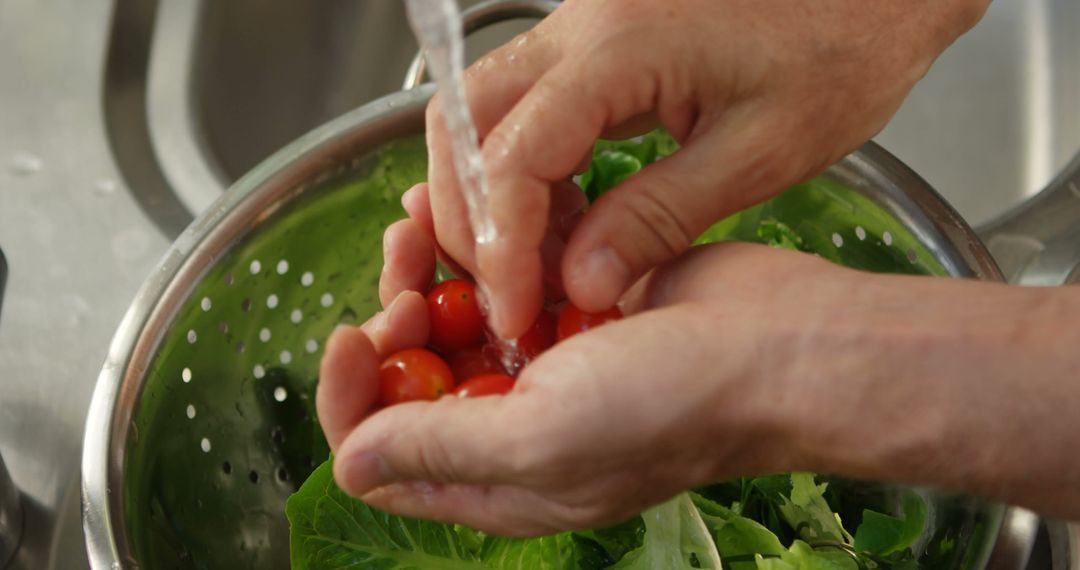 Hands Washing Fresh Cherry Tomatoes Over Kitchen Sink - Free Images, Stock Photos and Pictures on Pikwizard.com