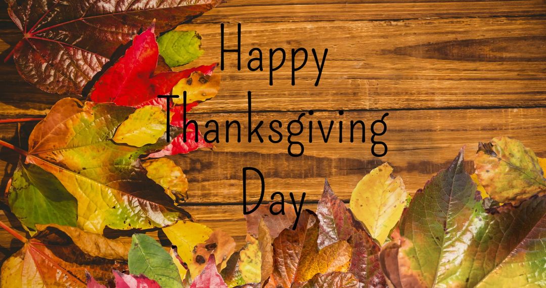Happy Thanksgiving Day Text Over Autumn Leaves