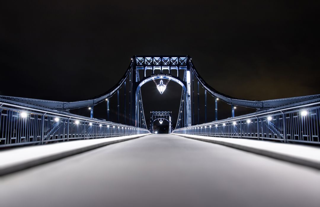 Illuminated Bridge at Night with Symmetrical Architecture - Free Images, Stock Photos and Pictures on Pikwizard.com