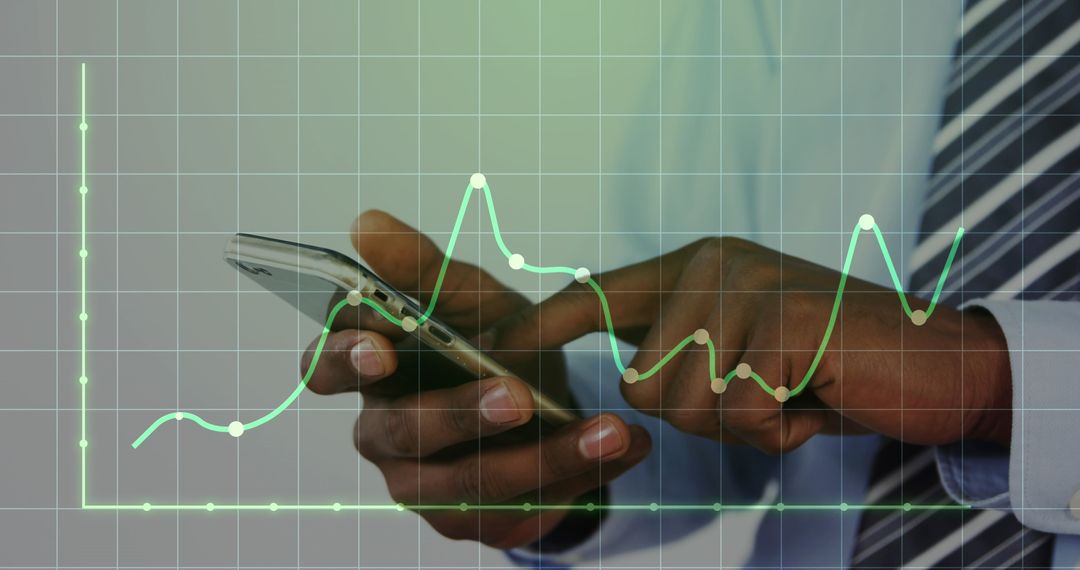 Businessman Analyzing Data on Smartphone with Overlay Graph