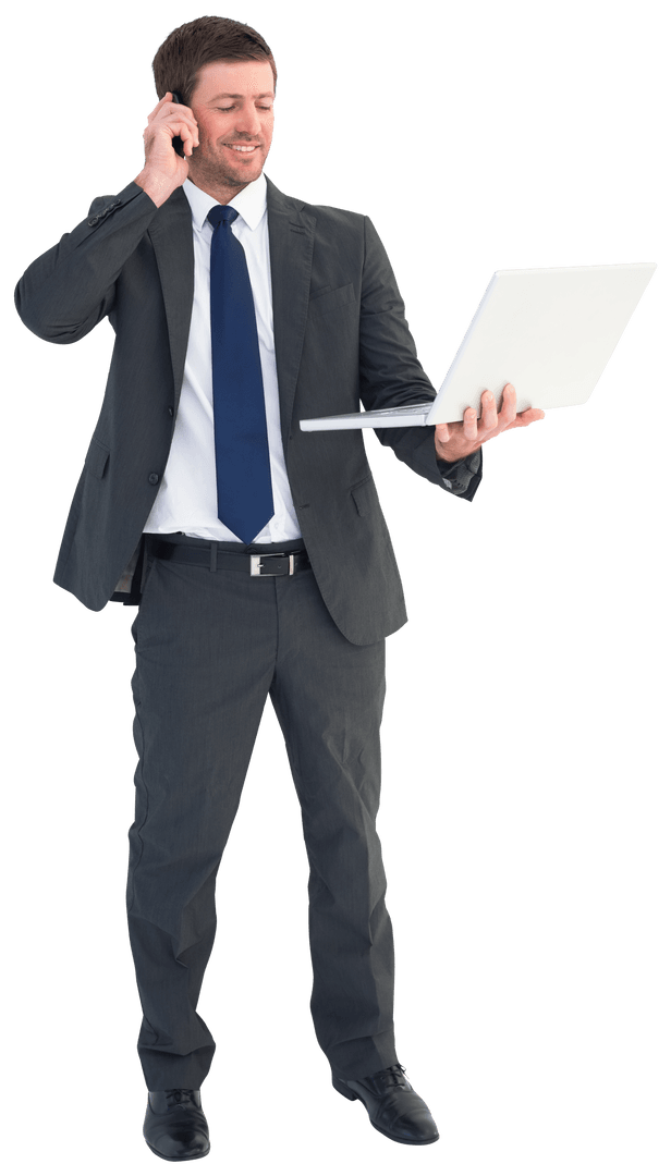 Businessman Holding Laptop While Talking on Mobile