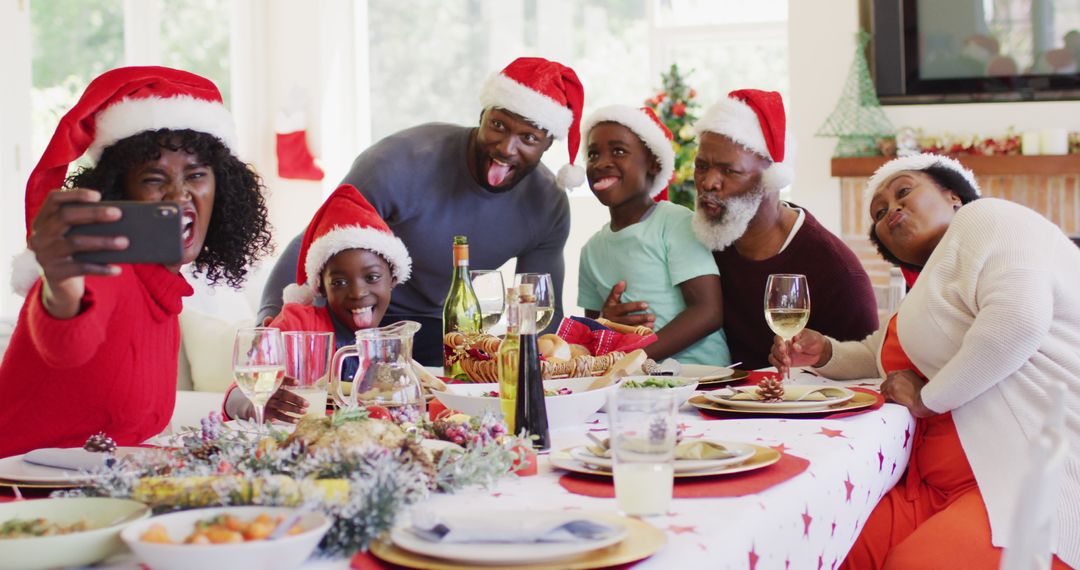 Festive Family Taking Selfie with Christmas Meal Fun - Free Images, Stock Photos and Pictures on Pikwizard.com