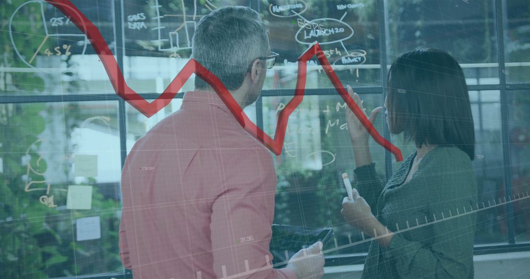 Business Meeting with Data Analysis and Red Declining Graph Overlay