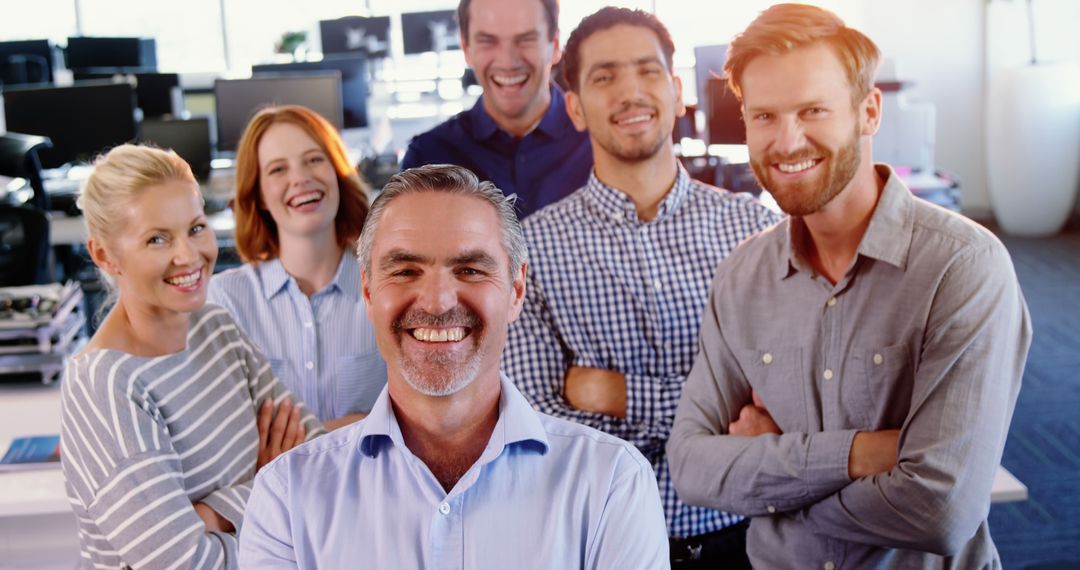 Diverse Professional Team Smiling in Modern Office