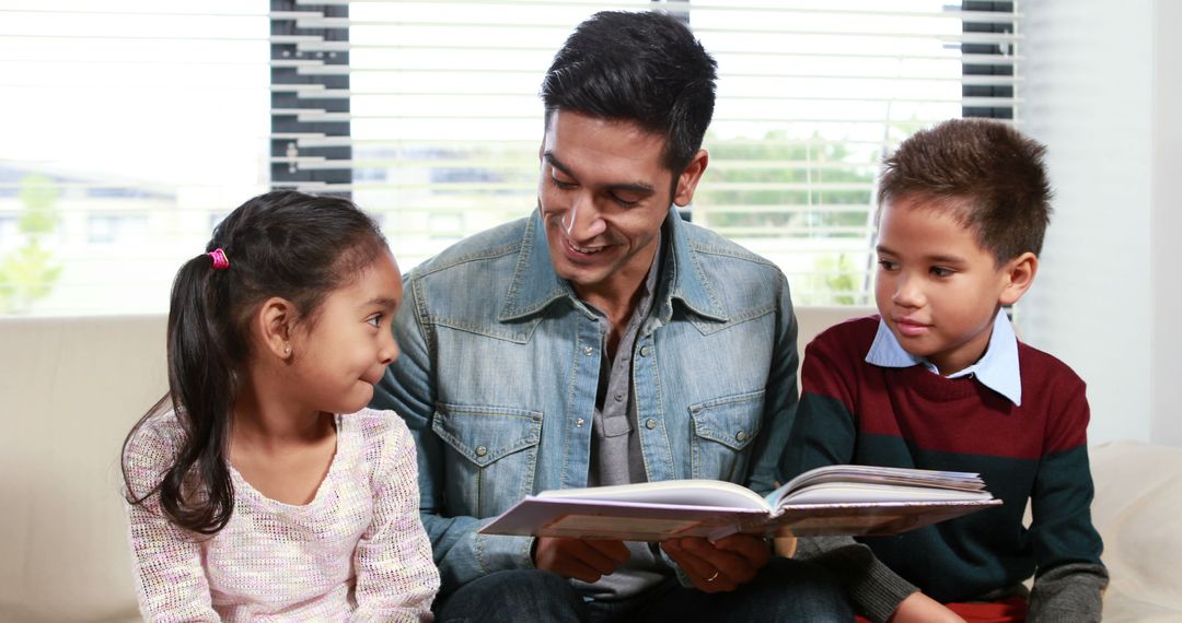 Father Reading Book with Children on Couch - Free Images, Stock Photos and Pictures on Pikwizard.com