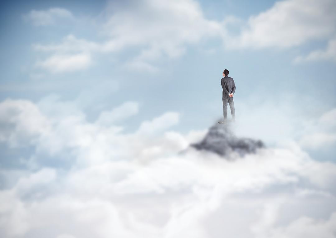 Business man standing on mountain peak in the clouds - Free Images, Stock Photos and Pictures on Pikwizard.com