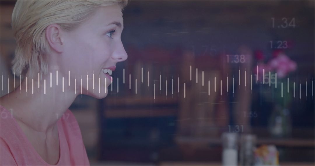 Woman Analyzing Digital Waveform in Modern Café Setting