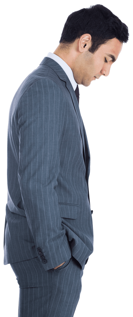 Asian Businessman Looking Down with Hands in Pockets Transparent