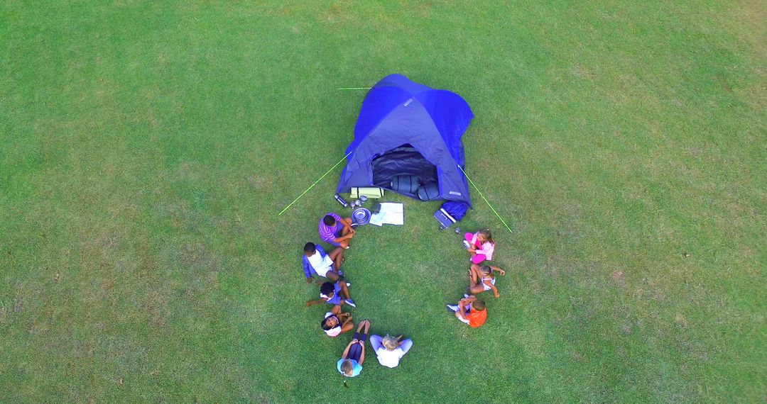 Top View of Group Discussing in Circle On Camping Trip - Free Images, Stock Photos and Pictures on Pikwizard.com