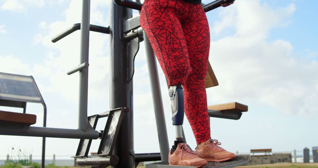 Athletic Woman Exercising Outdoors on Fitness Equipment - Free Images, Stock Photos and Pictures on Pikwizard.com