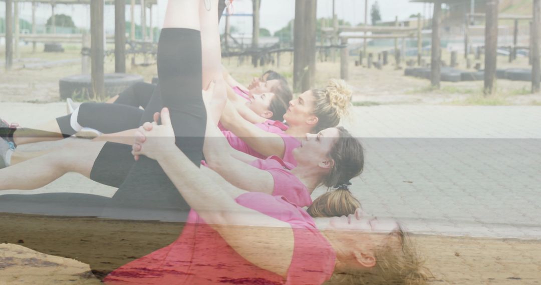 Group of Women Wearing Pink Engaging in Outdoor Calisthenics Workout