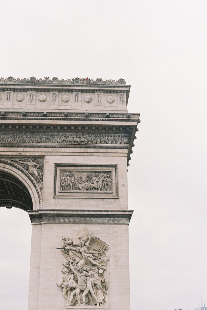 Partial View of Arc de Triomphe Capturing Detailed Reliefs and Sculptures
