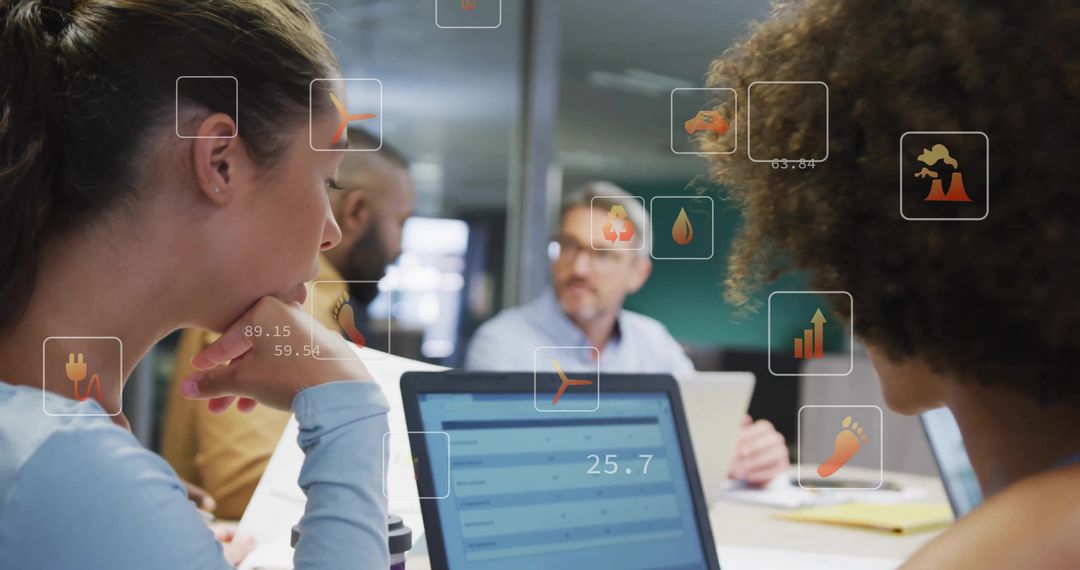 Team Collaborating in Office with Laptop and Augmented Reality Data Dashboards