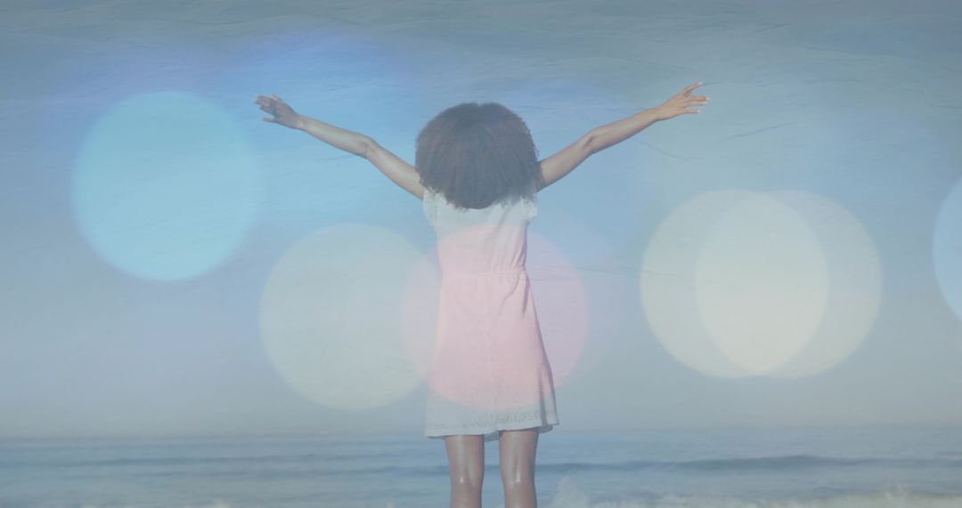 Serene Woman by Ocean with Outstretched Arms and Gentle Dreamy Flair