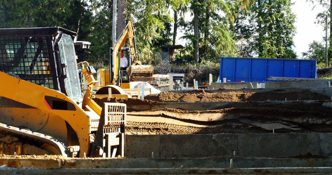 Construction Site with Heavy Machinery and Excavators - Free Images, Stock Photos and Pictures on Pikwizard.com