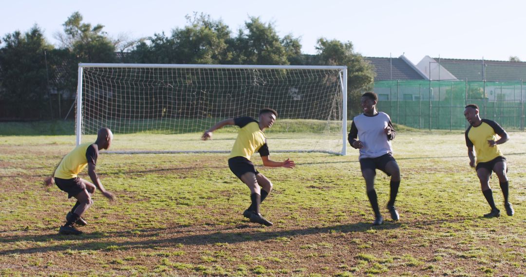 Athletic Teammates Training on Soccer Field