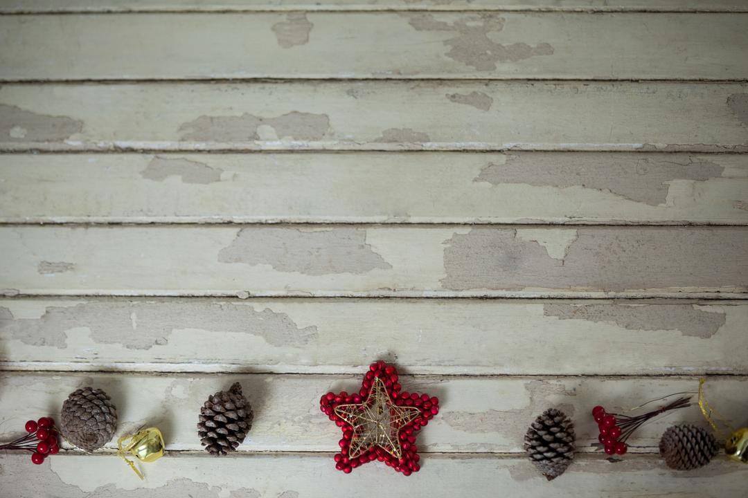 Rustic Christmas Star and Pine Cones on Weathered Wood - Free Images, Stock Photos and Pictures on Pikwizard.com
