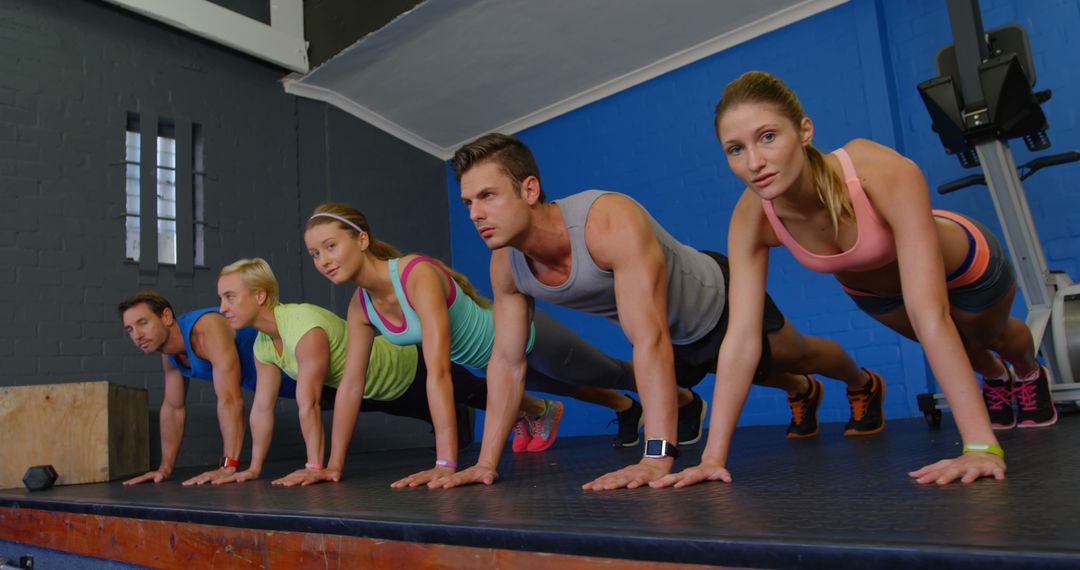 Group Fitness Training Plank Exercise - Free Images, Stock Photos and Pictures on Pikwizard.com