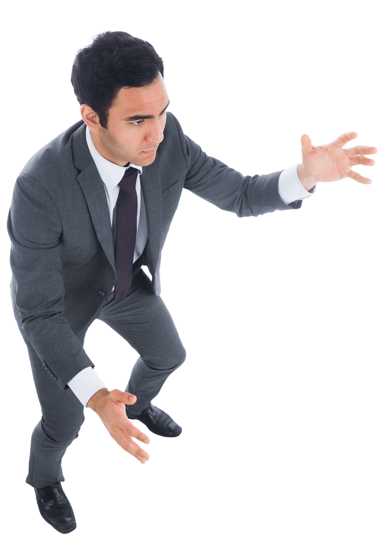 Focused Businessman on Transparent Background Holding Something