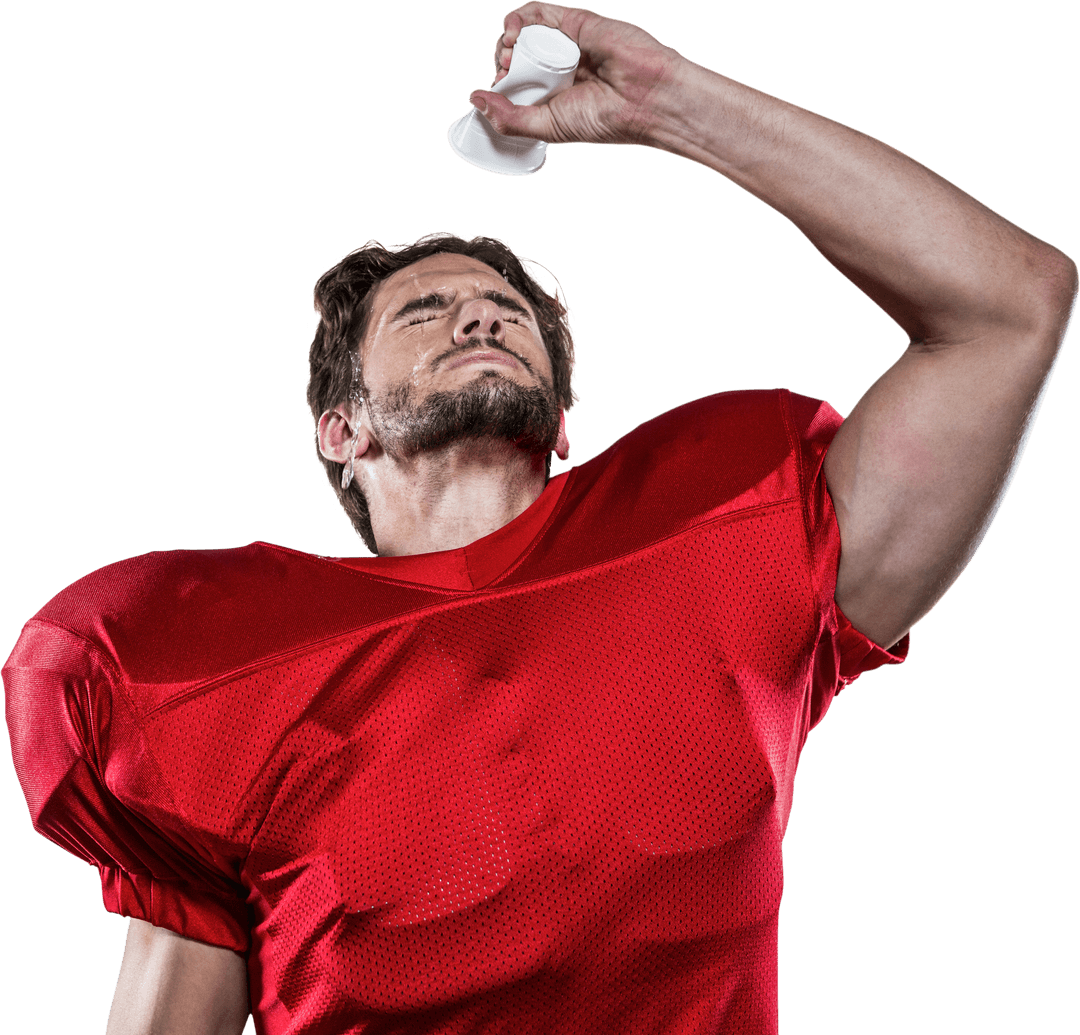 Transparent View: Football Player Refreshing with Water Splash
