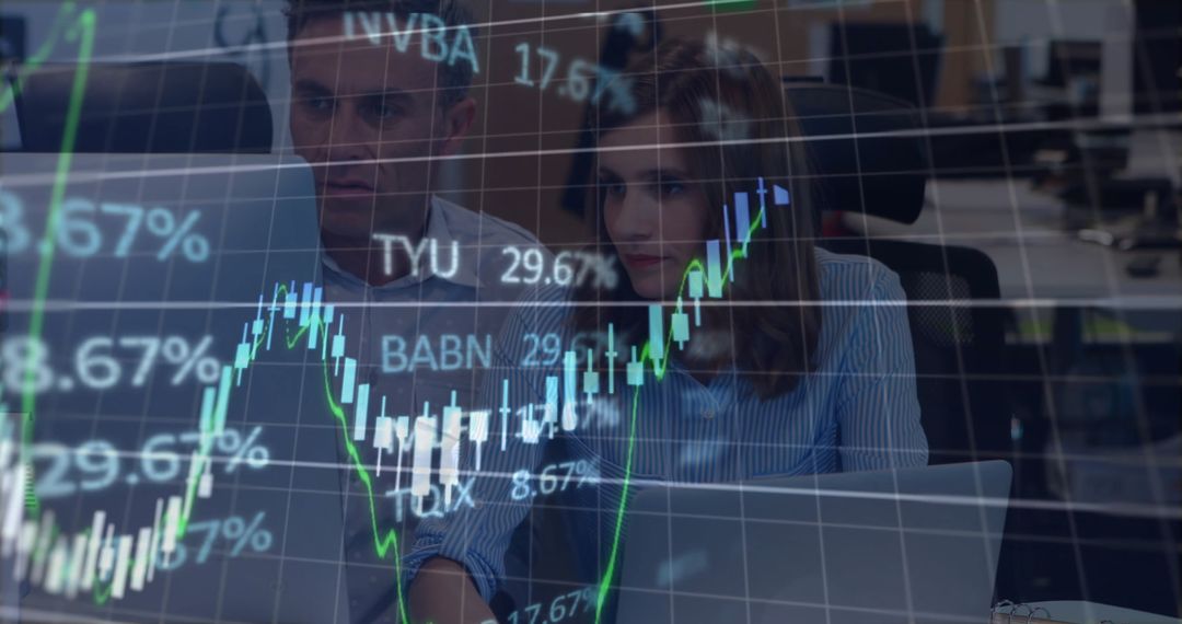 Business Team Analyzing Stock Market Data with Digital Interface