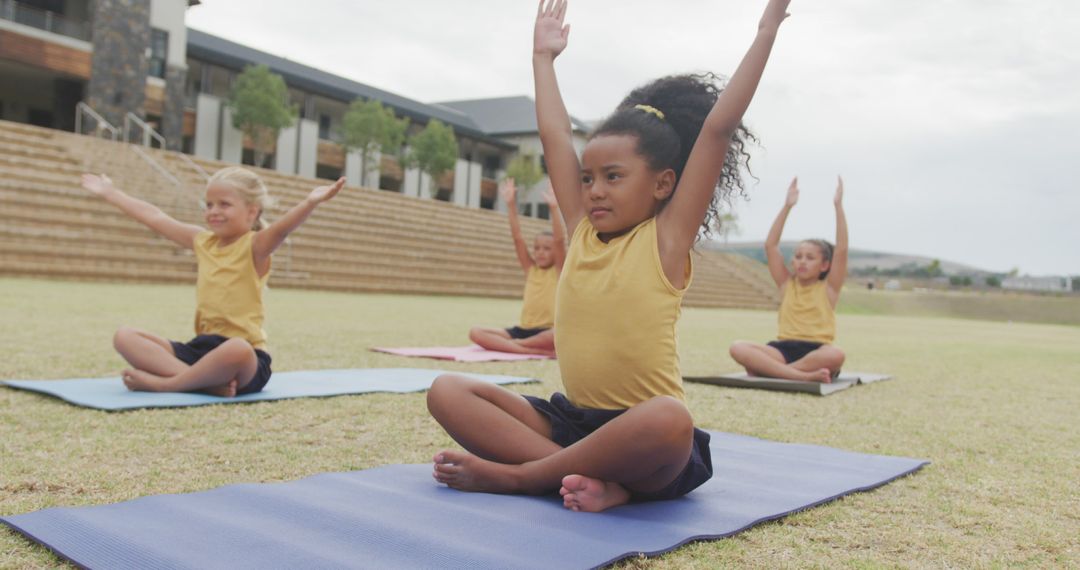 Diverse Group of Children Practicing Yoga in Outdoor Class - Free Images, Stock Photos and Pictures on Pikwizard.com