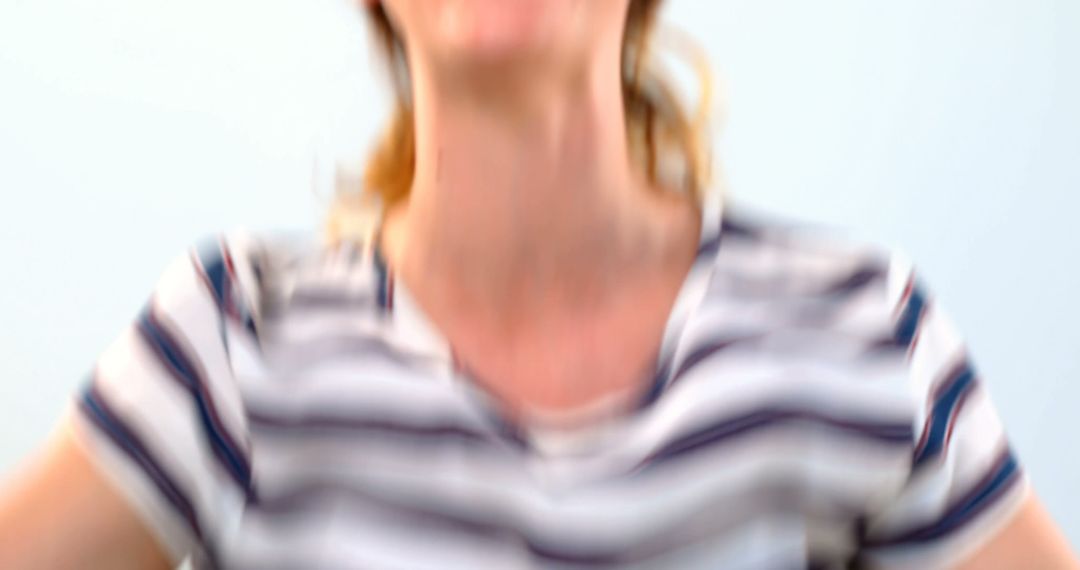 Blurry Woman with Striped Shirt in Motion - Free Images, Stock Photos and Pictures on Pikwizard.com