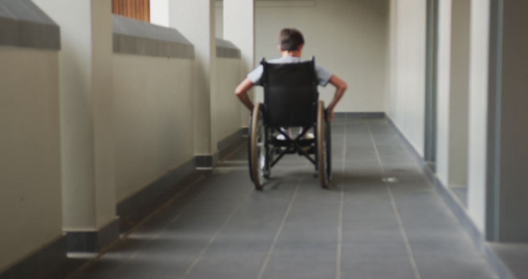 Wheelchair User Navigating School Hallway with Confidence