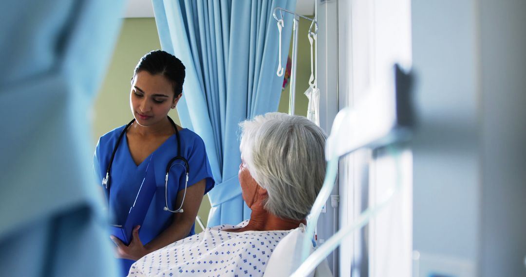 Young Female Nurse Assisting Elderly Patient in Hospital Room - Free Images, Stock Photos and Pictures on Pikwizard.com