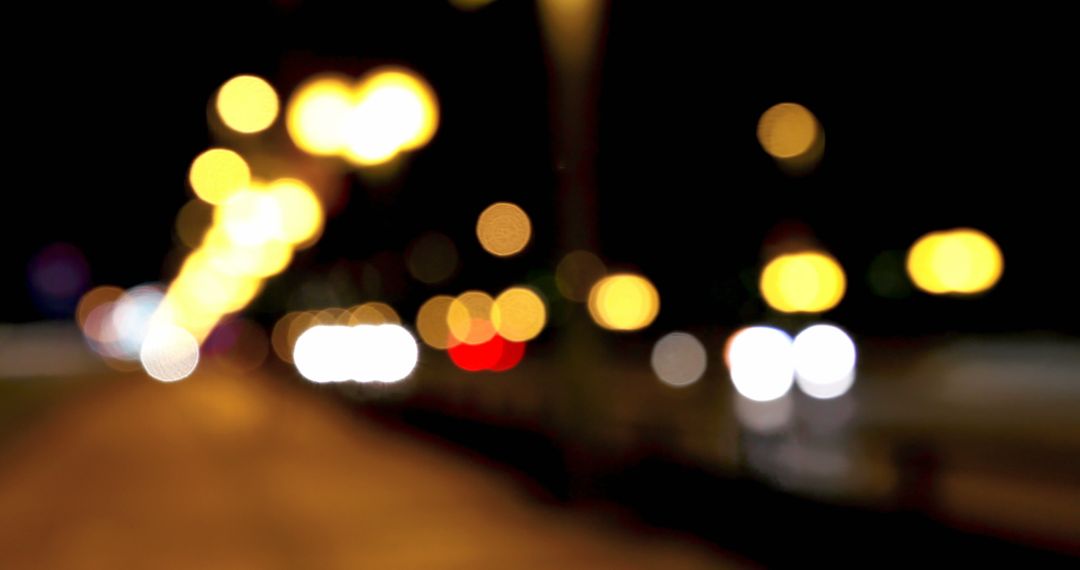 Urban bokeh lights creating dreamlike nighttime atmosphere