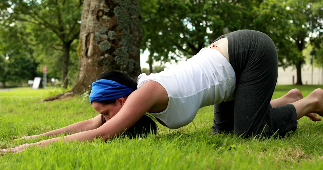 Woman Performing Yoga Pose Outdoors in Park - Free Images, Stock Photos and Pictures on Pikwizard.com