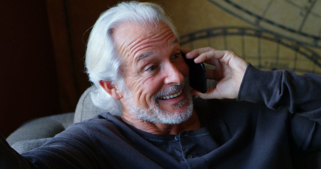 Senior Man with White Hair Smiling While Talking on Phone - Free Images, Stock Photos and Pictures on Pikwizard.com