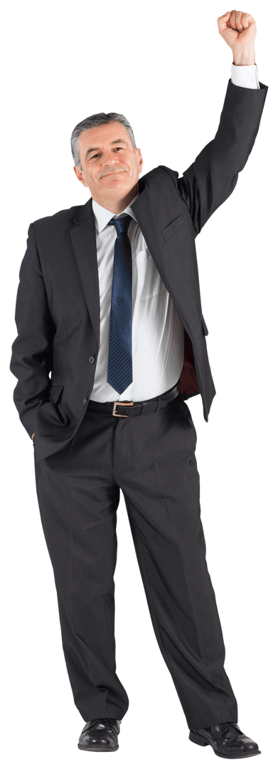 Mature Businessman Cheering in Triumph with Arm Raised