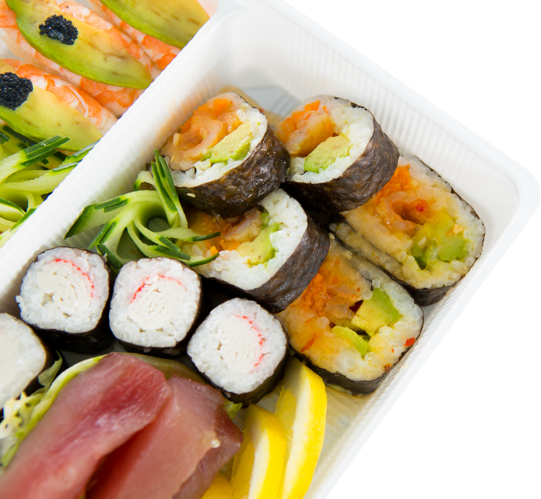 Close-up of Sushi Rolls, Nigiri and Garnish in Transparent Tray - Download Free Stock Images Pikwizard.com