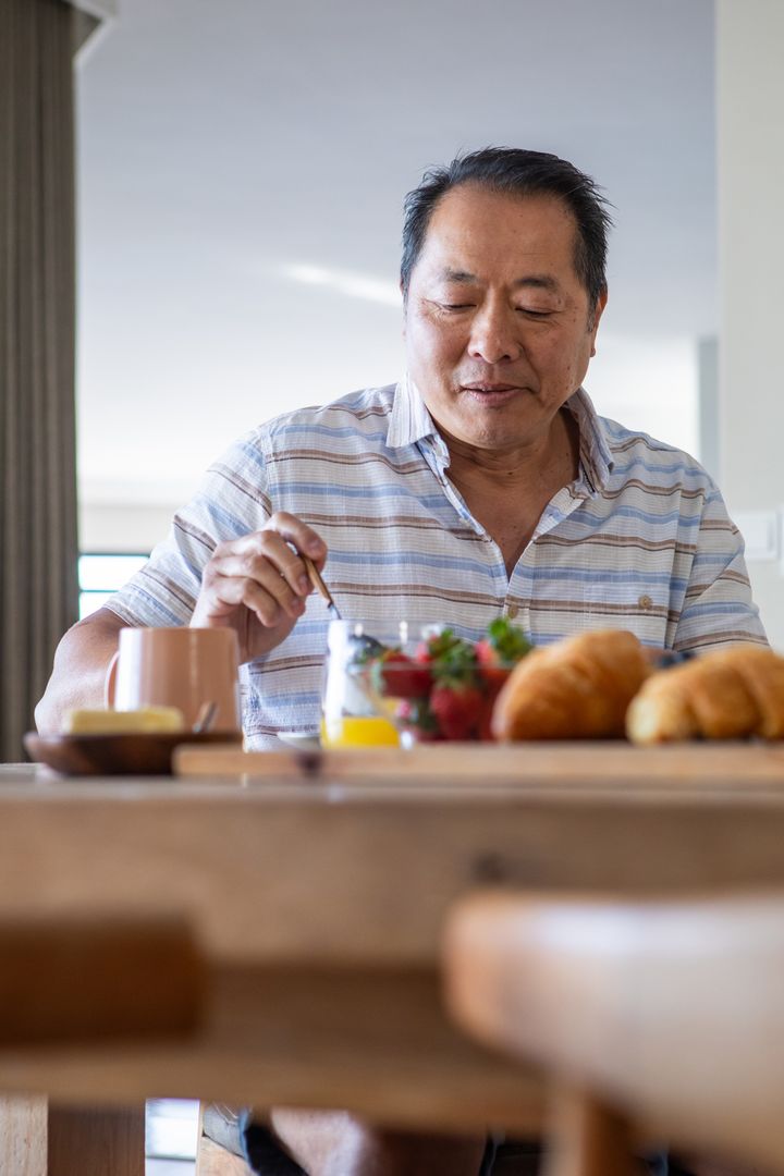 Warm Breakfast Scene with Mature Chinese Man at Home