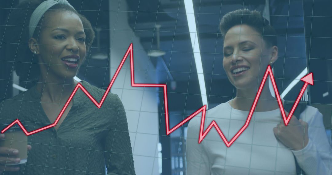 Businesswomen Collaborating with Financial Data Overlay Graph Increases
