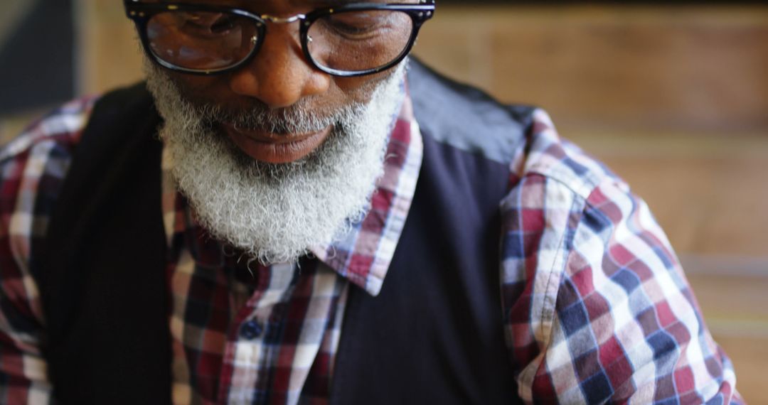 Stylish Elderly Man with White Beard Wearing Glasses - Free Images, Stock Photos and Pictures on Pikwizard.com