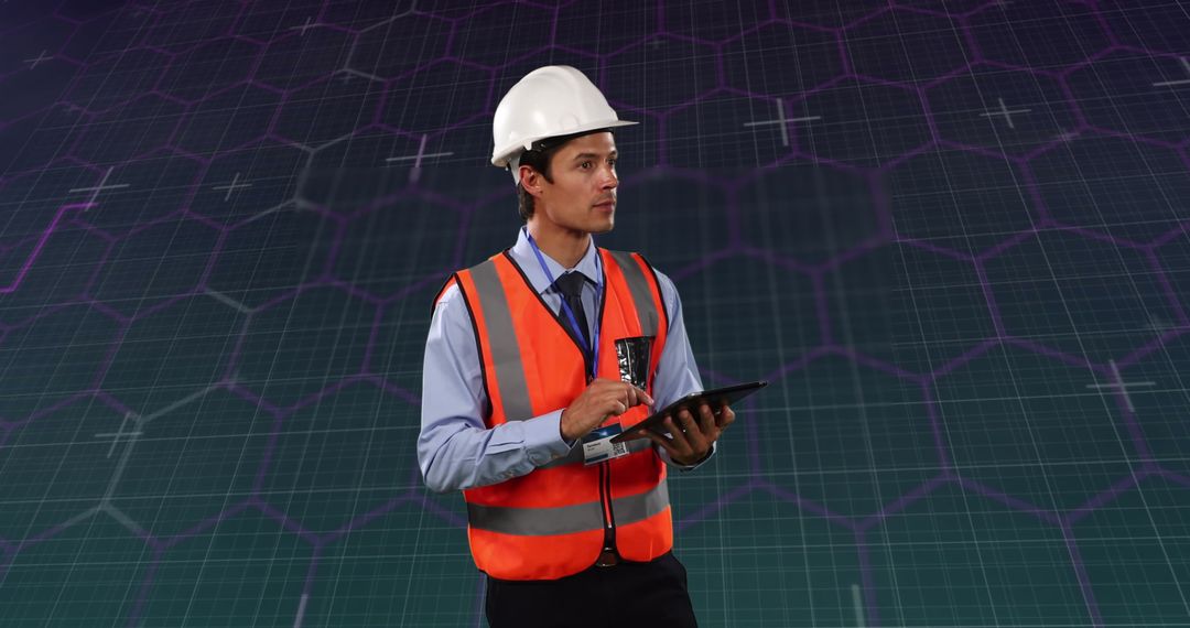 Engineer in Safety Gear Analyzing Financial Data on Digital Tablet
