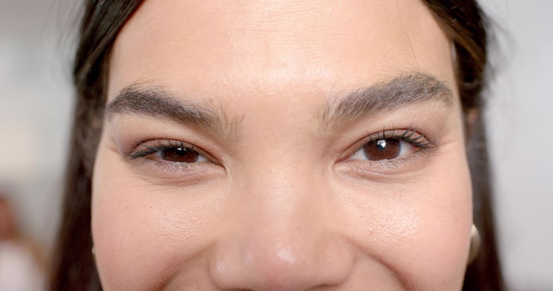 Close-up of Woman Winking, Highlighting Elegance and Sophistication