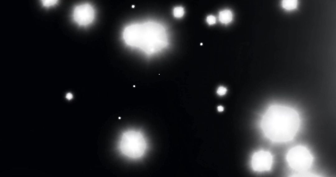 Abstract Glowing Light Spots on Dark Background Concept