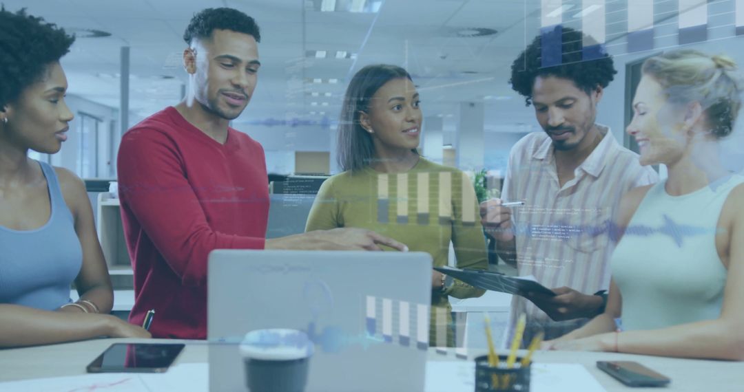 Diverse Team Collaborating on Data Visualization Project in Modern Office