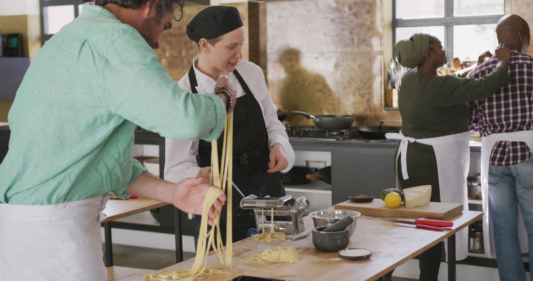 Diverse Group Enjoying Cooking Class Making Fresh Pasta