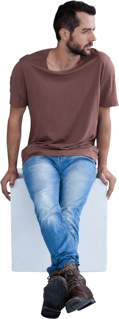 Man Sitting on Transparent Seat Wearing Casual Attire