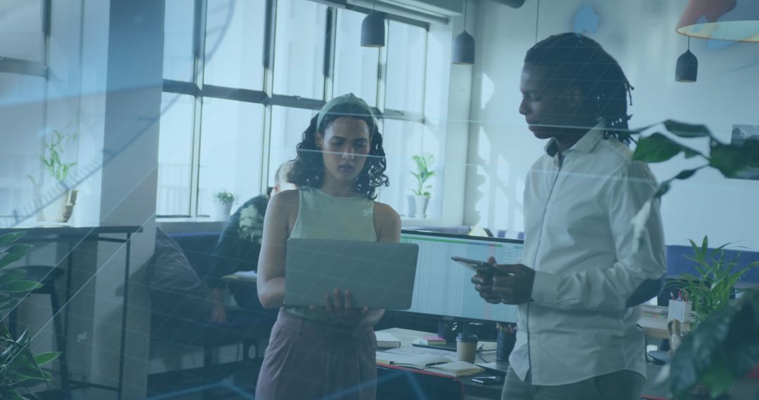 Digital Interface with Diverse Team in Modern Office