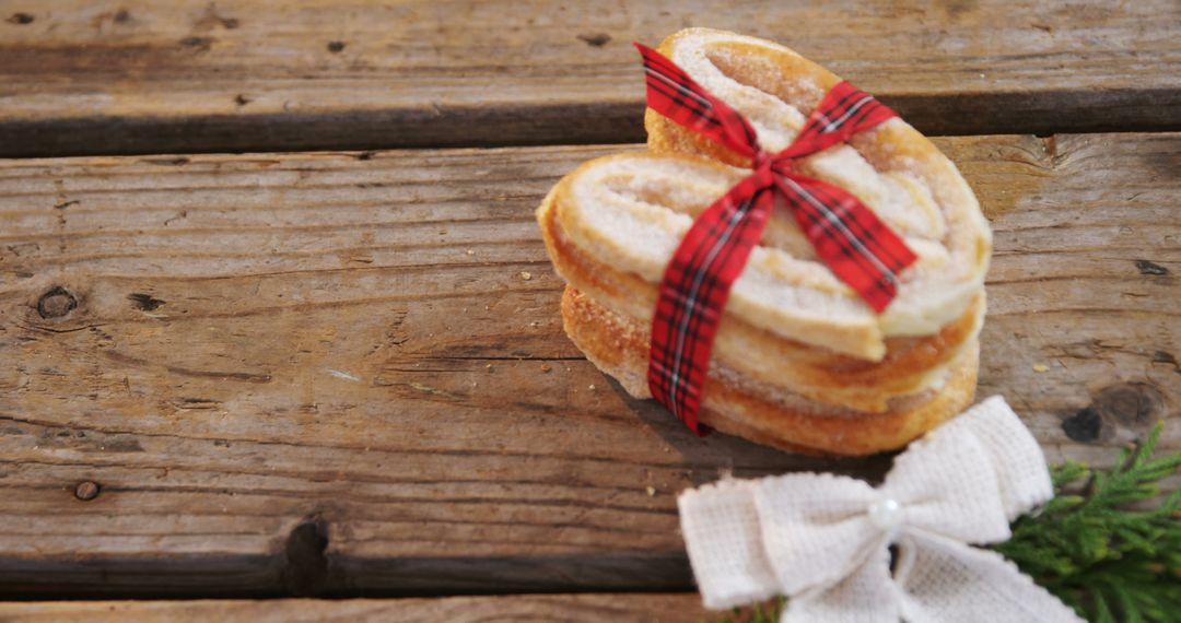 Heart-Shaped Festive Cookies Tied with Red Plaid Bow