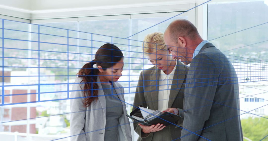 Business Professionals Engaged with Digital Interface in Modern Office