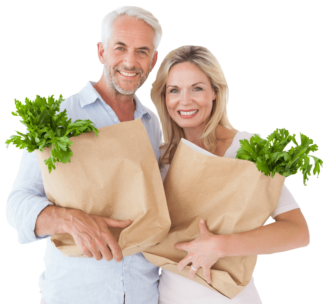 Cheerful Couple Holding Transparent Grocery Bags with Fresh Vegetables